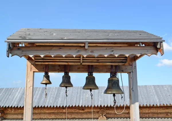 Church bells on a wooden belfry of the Sacred and Troitsk Trifon — Stock Photo, Image