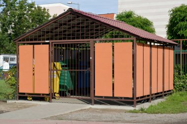The closed container platform for trash cans. Poland clipart