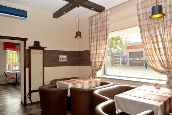 Interieur eines modernen Cafés in Brauntönen — Stockfoto