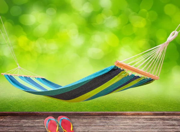 Relaxing on hammock in garden — Stock Photo, Image