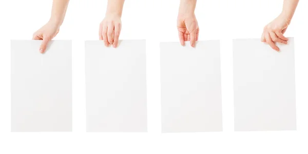 Mãos segurando papel em branco isolado — Fotografia de Stock
