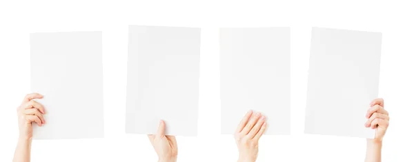 Mãos segurando papel em branco isolado — Fotografia de Stock