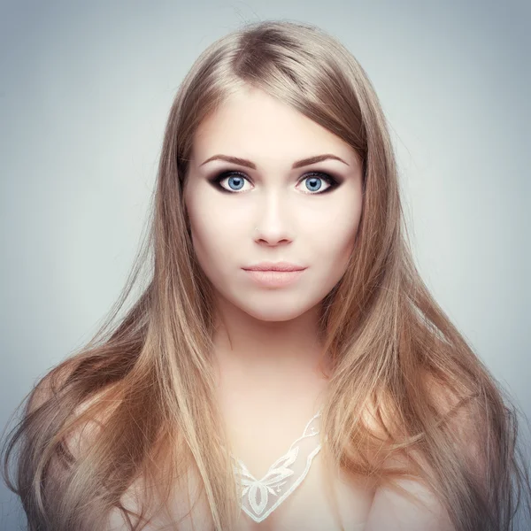 Portrait of the blonde with blue eyes. Royalty Free Stock Images