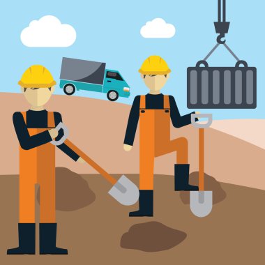 Bir kürek tutan inşaat işçileri