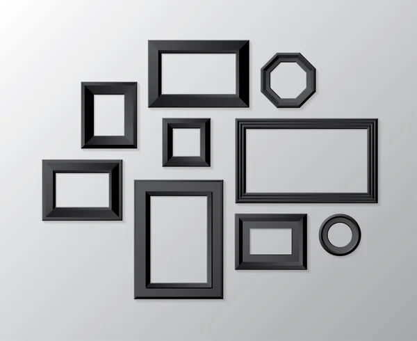 Conjunto vectorial de marcos de fotos en negro en la pared blanca — Vector de stock