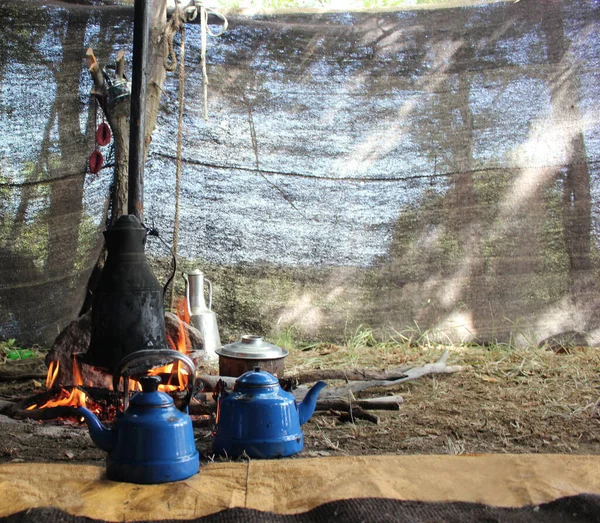 The life of nomadic people. Tea and food is cooked in the tent.