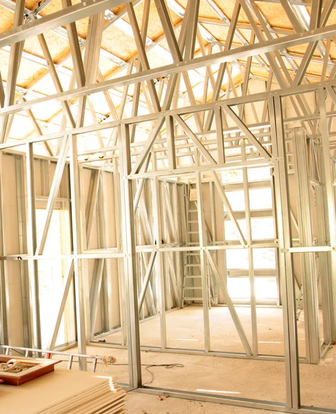 Metal frame of prefabricated house building.