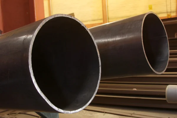 The steel pipes manufactured in the factory — Stock Photo, Image