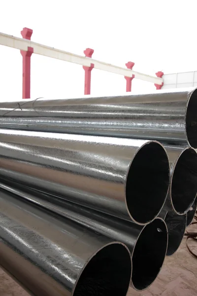 The steel pipes manufactured in the factory — Stock Photo, Image