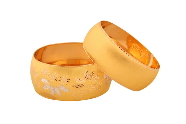 Schillernde goldene Armbänder Hintergrund — Stockfoto