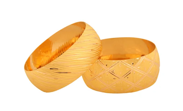 Schillernde goldene Armbänder Hintergrund — Stockfoto