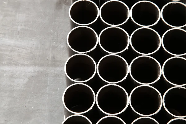 The steel pipes manufactured in the factory — Stock Photo, Image