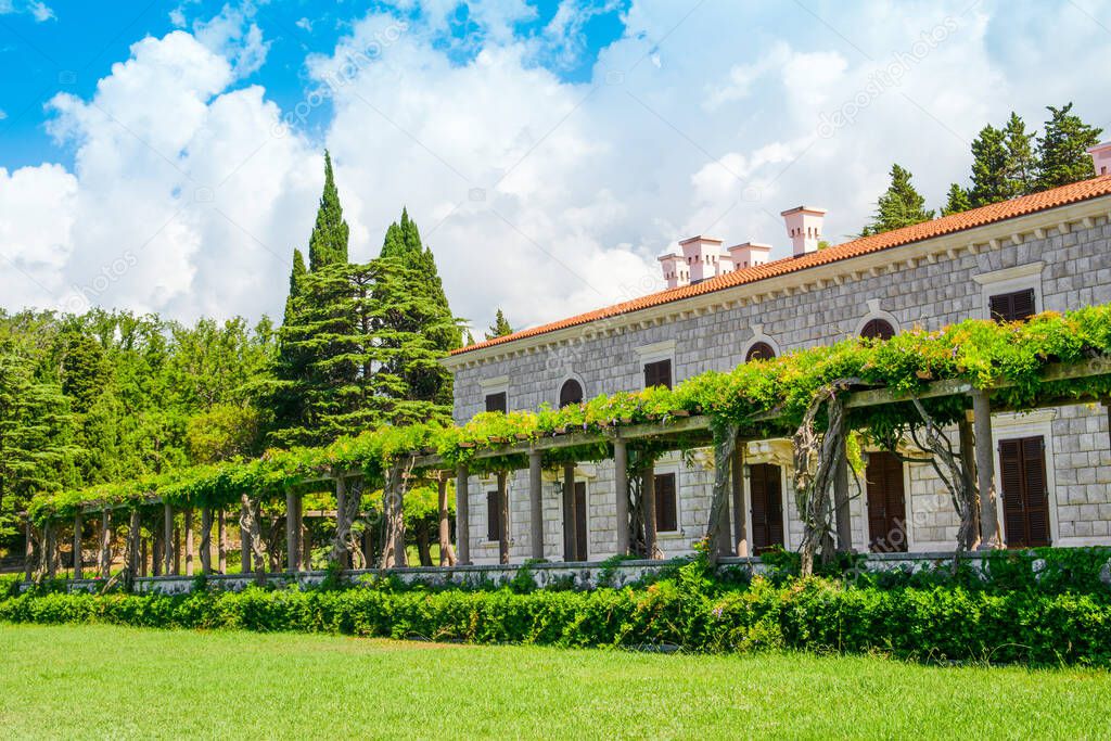 Panoramic summer landscape of the beautiful green Royal park and Villa Milocer on the shore of the the Adriatic Sea, Montenegro