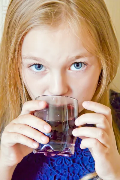 Cute girl drinking beverage — Stock Photo, Image