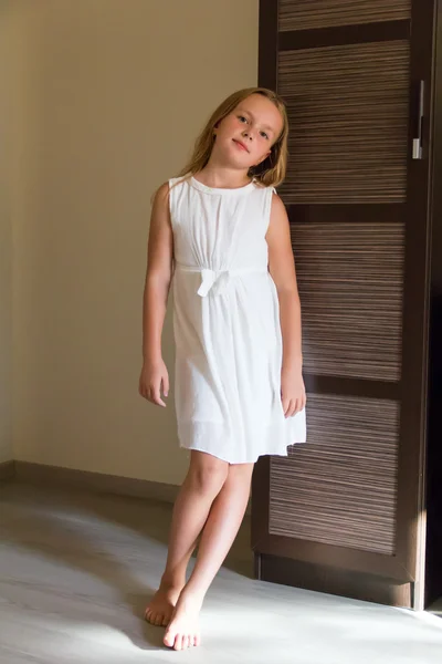Cute girl in white dress — Stock Photo, Image