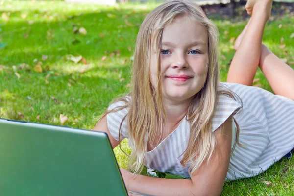 Cute girl with laptop — Stock Photo, Image