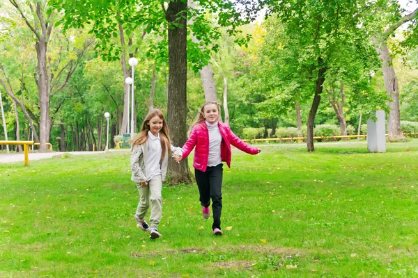 Cute two running girls — Stock Photo, Image