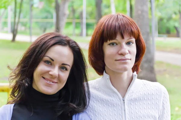 Women with brown and black hairs — Stock Photo, Image