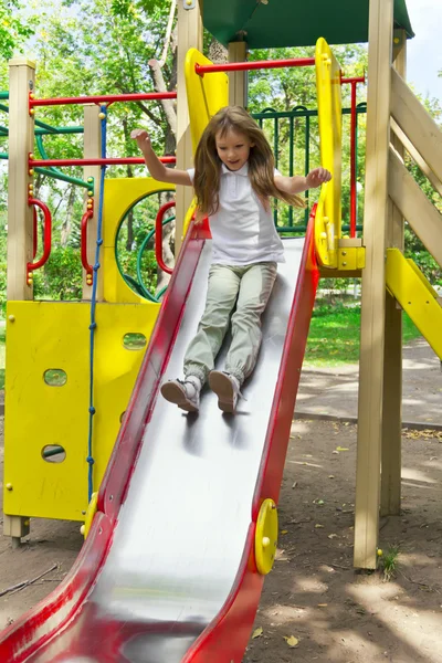 Active girl on nursery platform in summer — Stock Photo, Image