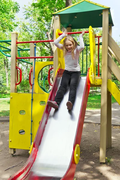 Active girl on nursery platform in summer — Stock Photo, Image