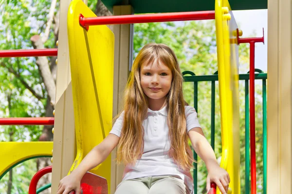 Active girl on nursery platform in summer — Stock Photo, Image