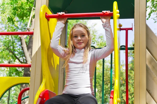 Active girl on nursery platform in summer — Stock Photo, Image