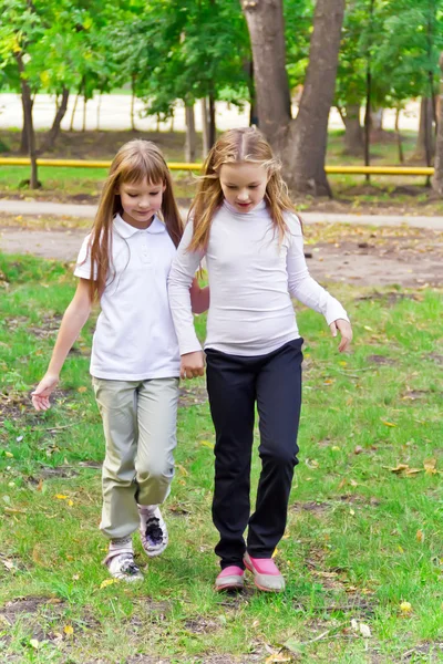 Cute two walking girls — Stock Photo, Image