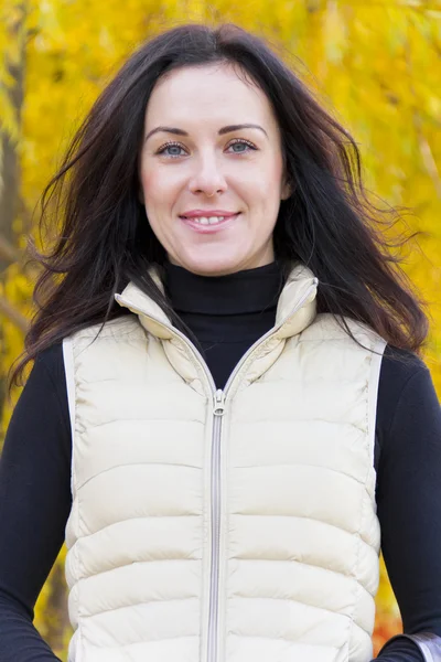 Brunette in white cout — Stock Photo, Image