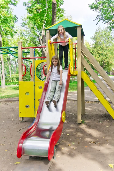 Two active girls on nursery platform — Stock Photo, Image