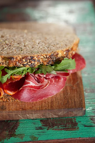 Cured meat sandwich with bread — Stock Photo, Image