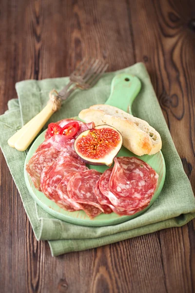 Meat platter of Cured Meat and figs — Stock Photo, Image