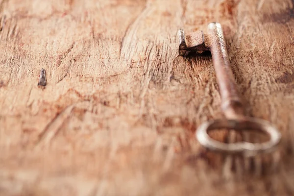 Large rusty vintage metal key — Stock Photo, Image