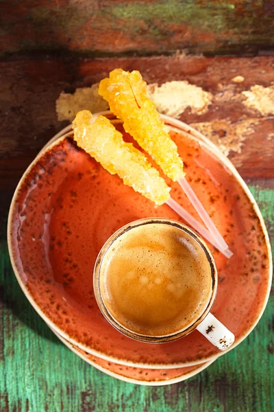 A cup of coffee with stick sugar — Stock Photo, Image