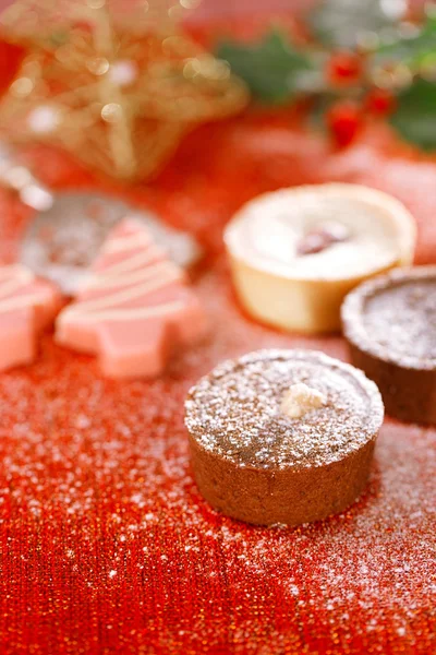 Chocolate tartlets in festive style — Stock Photo, Image