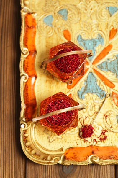 Saffron spice in antique glass bowls — Stock Photo, Image