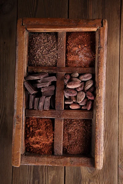 Old spicy box full of chocolate — Stock Photo, Image