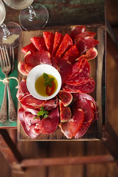 Cured Meat and vintage forks — Stock Photo, Image