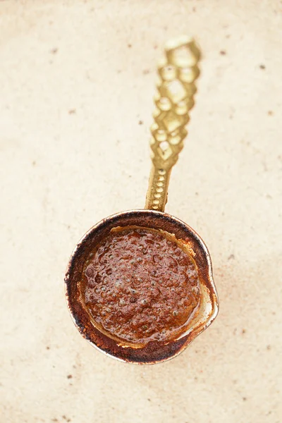 Coffee preparation in copper pot — Stock Photo, Image