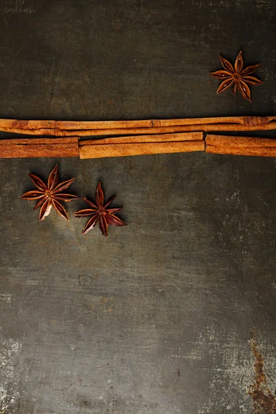 Cinnamon sticks and anise stars — Stock Photo, Image