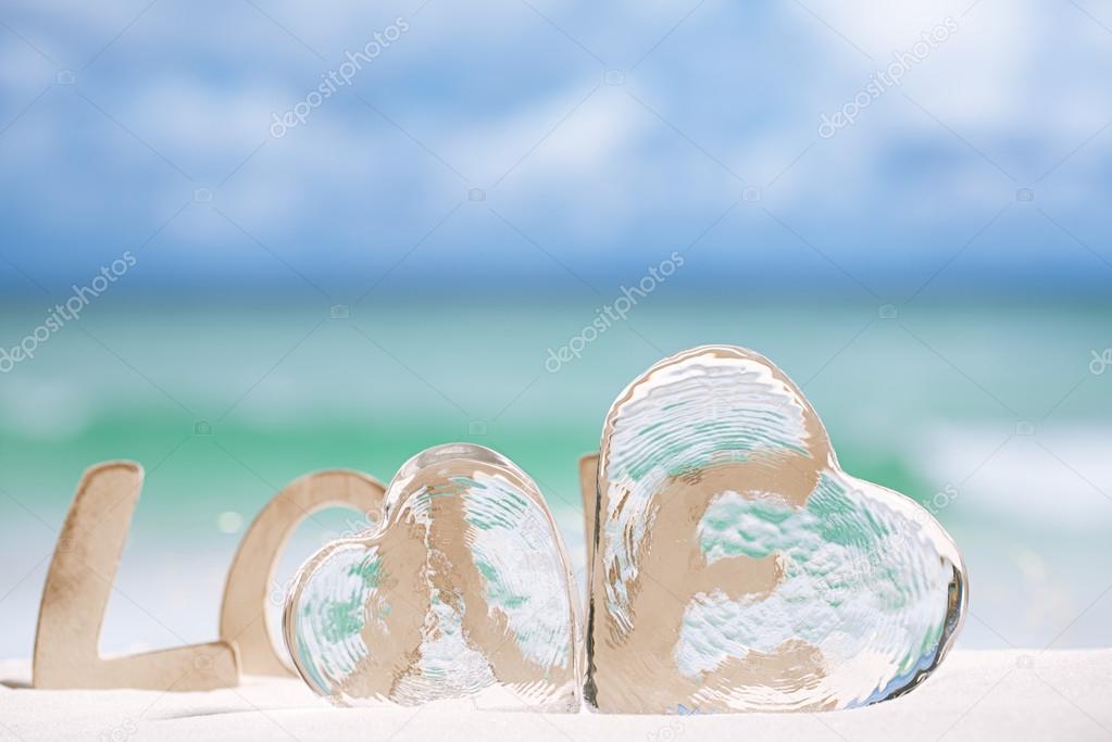 love message and glass hearts
