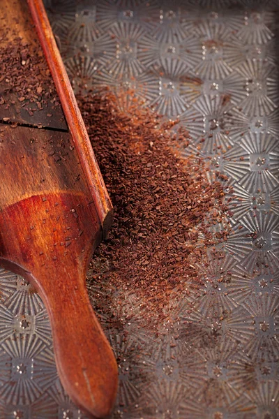 Grated 100% dark chocolate flakes — Stock Photo, Image