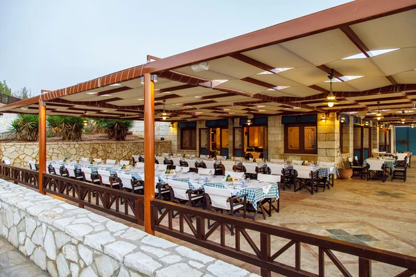 Interior of the restaurant with covered tables — Stock Photo, Image