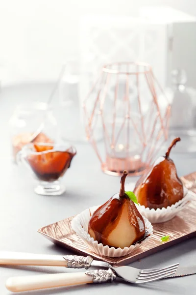 Pears in dark chocolate, sweet dessert, closeup shot — Stock Photo, Image