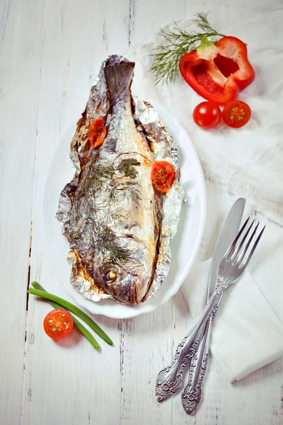 Homemade dorado fish baked with vegetables — Stock Photo, Image
