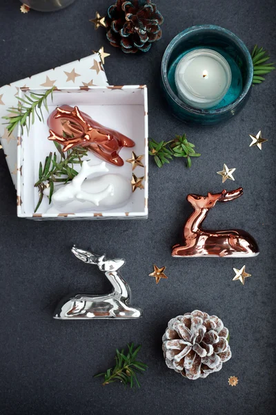 Christmas decor - ceramic reindeer in copper, silver and white c — Stock Photo, Image