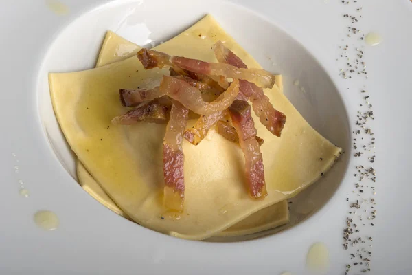 Ravioli-like pasta with pork — Stock Photo, Image