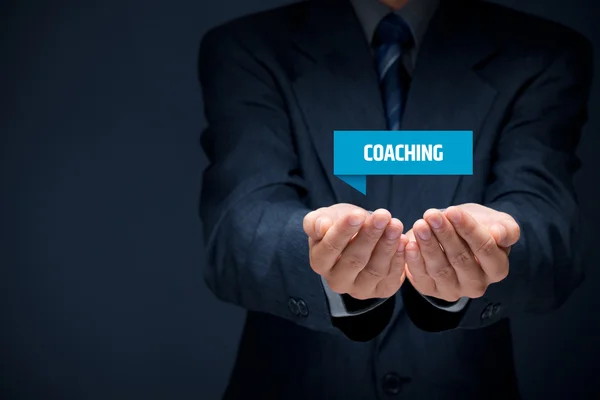 Coach mostrando etiqueta virtual — Foto de Stock