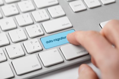 data migration on keyboard clipart