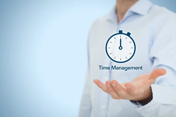 Empresario con reloj de reloj espera fecha límite —  Fotos de Stock