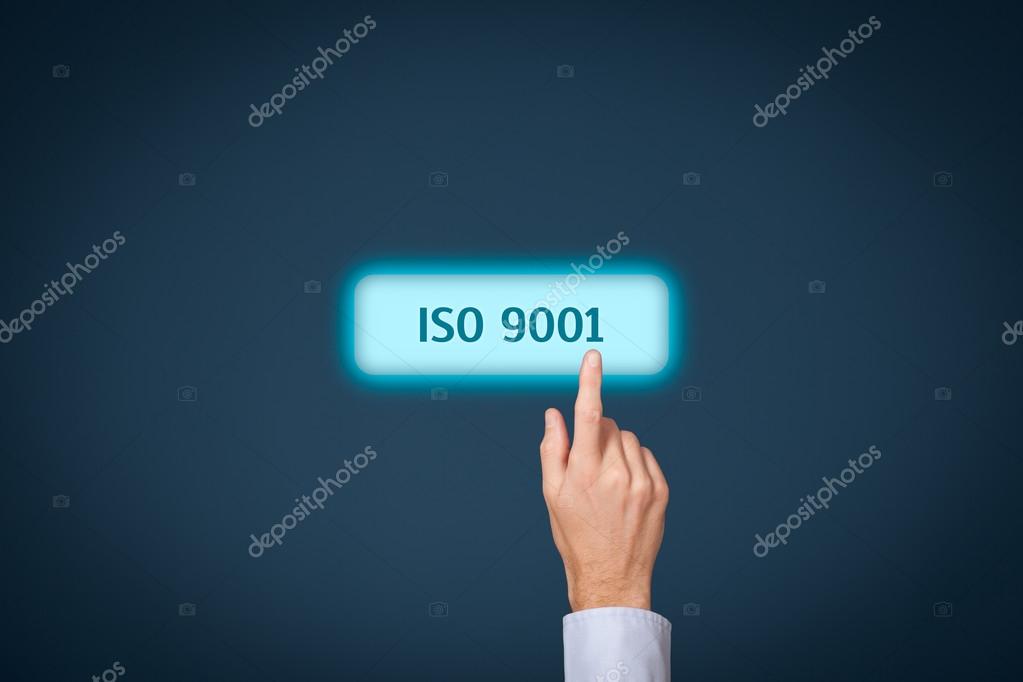 ISO 9001 - quality management system. Businessman click on button with ISO 9001 - certification concept